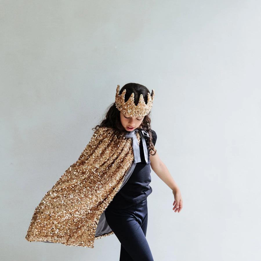 MIMI & LULA Goldener Umhang mit Pailletten